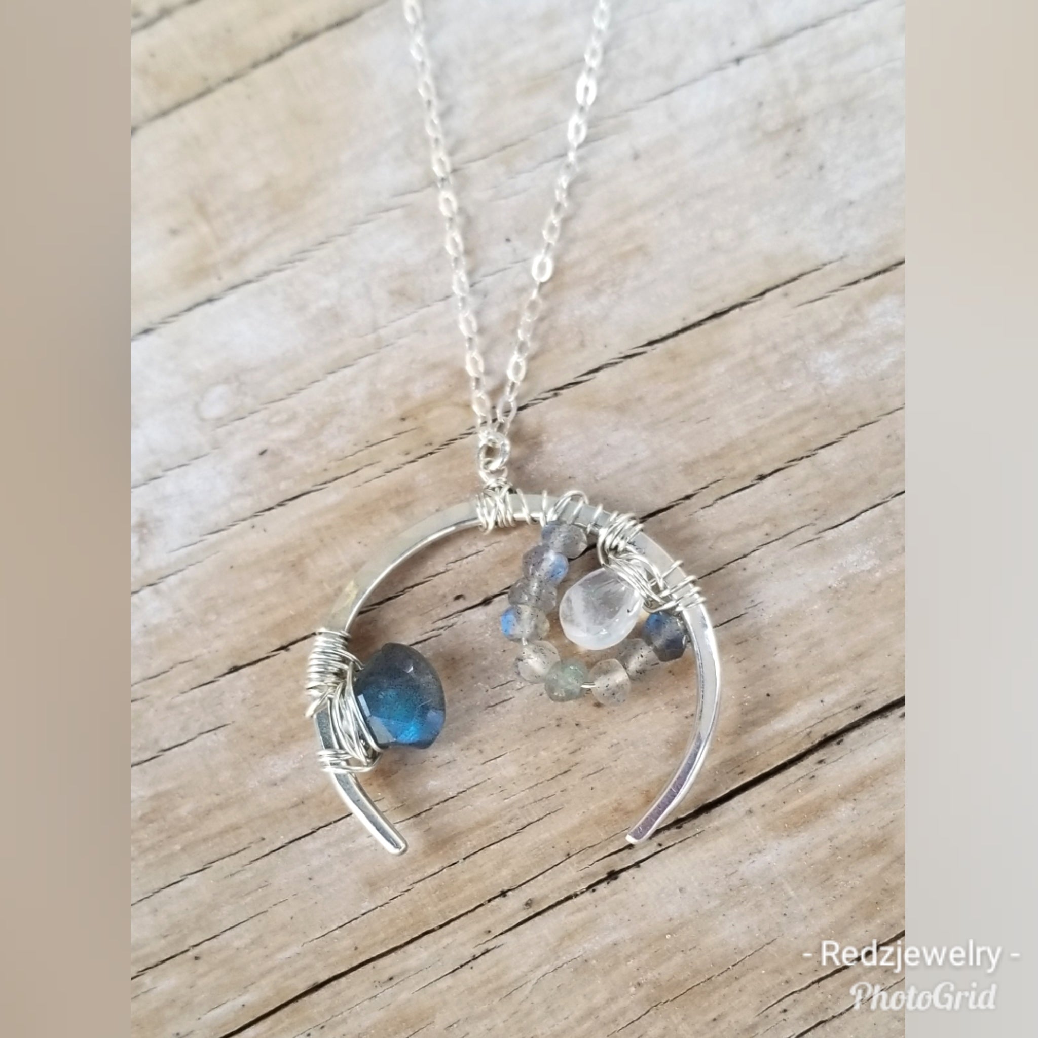 Gem wrapped crescent necklace